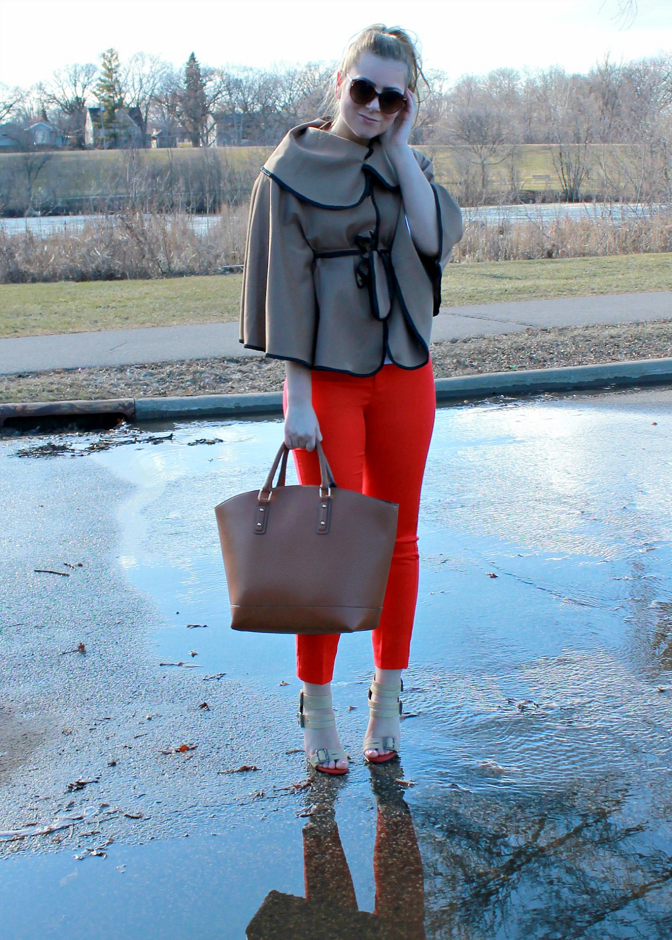red cropped pants + cape + large tote