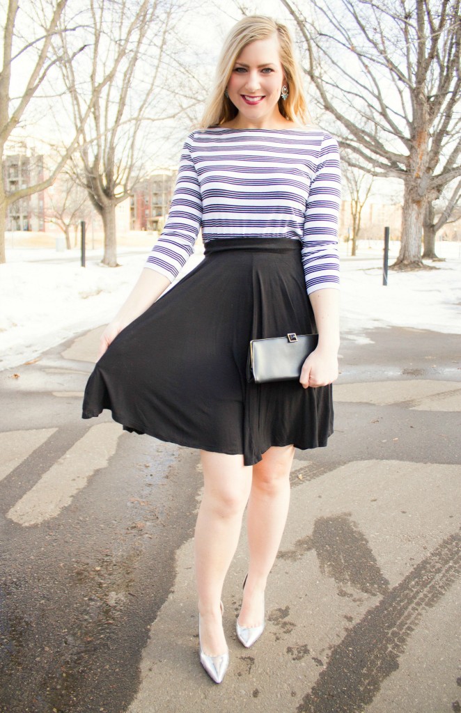 striped top, flowy black skirt, metallic heels