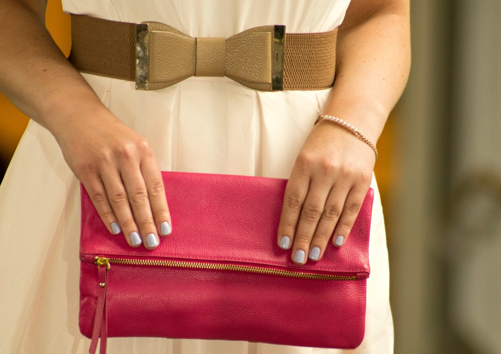bow belt and pink clutch